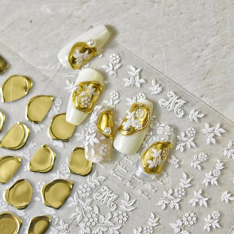 gold stamp and flower nail design