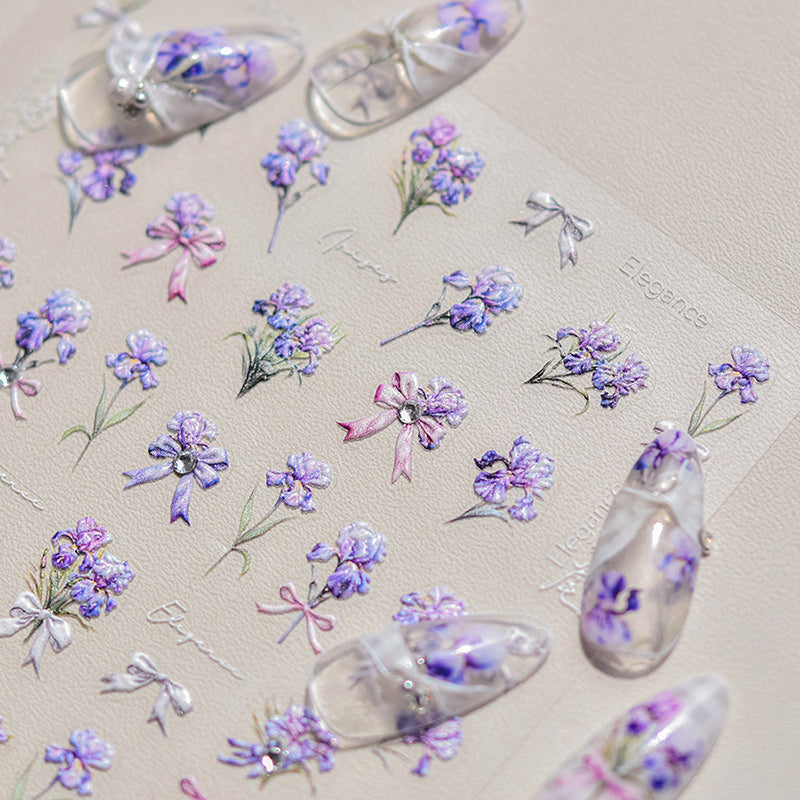 Nail stickers with intricate blue floral patterns perfect for springtime manicures