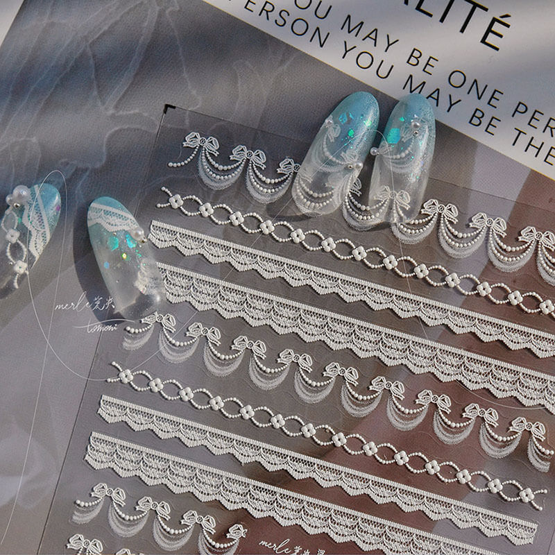 Detailed close-up of Dainty Lace Strip Nail Stickers, showcasing aesthetic lace strip pattern with bowknot design