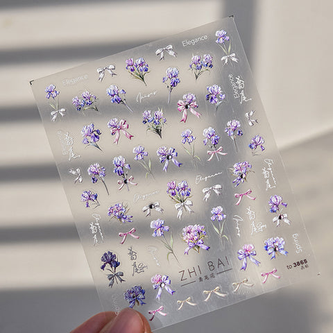 Flower nail stickers in assorted colors including blue, pink, and purple