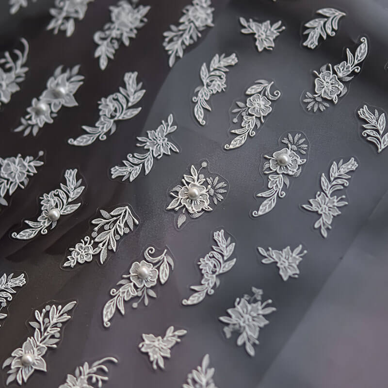Detailed close-up of White Flower Nail Stickers with Pearl Nail Charm