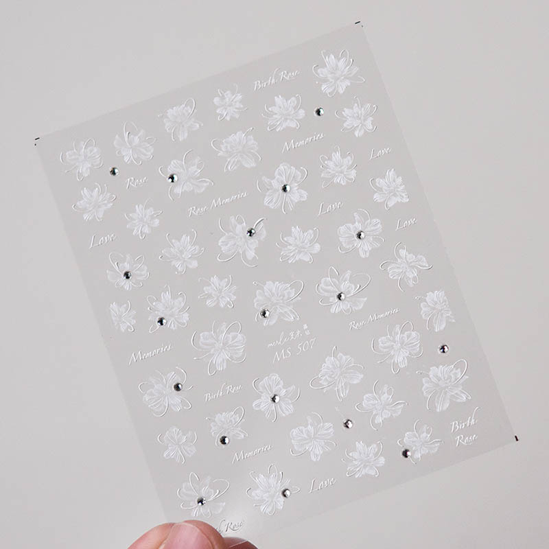 Elegant white flower nail sticker adorned with intricate crystal detailing