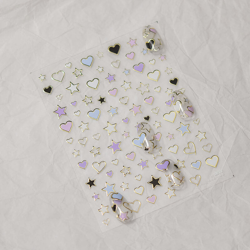 Vibrant Heart and Star Nail Art - Perfect for a bold manicure