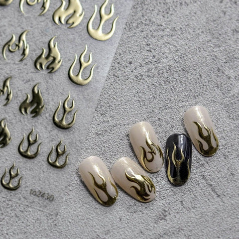 gold nail design with nail stickers